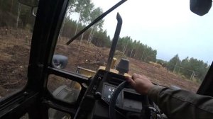 работаем на тракторе  корчуем пни и планировка участка