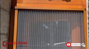 На дверь из евробруса установили москитную сетку плиссе в цвете золотой дуб. ОКНАЛЮКС Севастополь