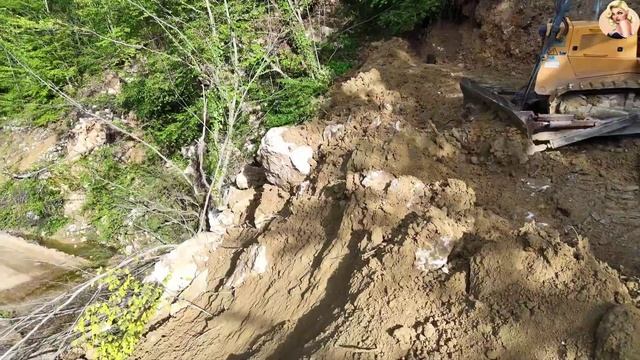 Строительство, срезаем горный склон, большой обзор смотреть онлайн