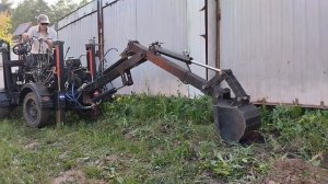 Погрузчик экскаватор. Планировка ландшафта под навес