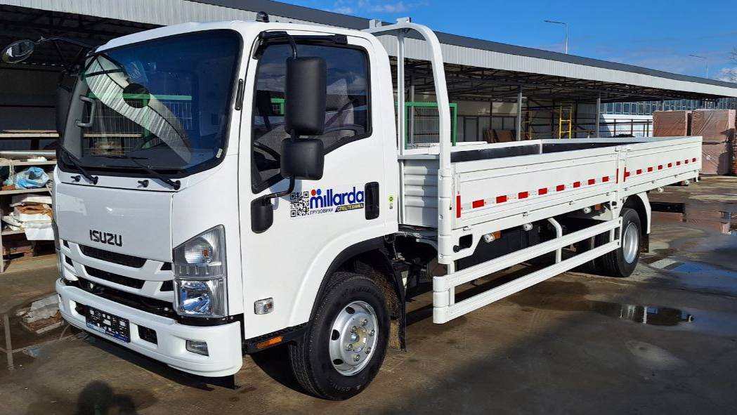 Isuzu Elf 700P бортовой грузовик 11995 кг. смотреть онлайн