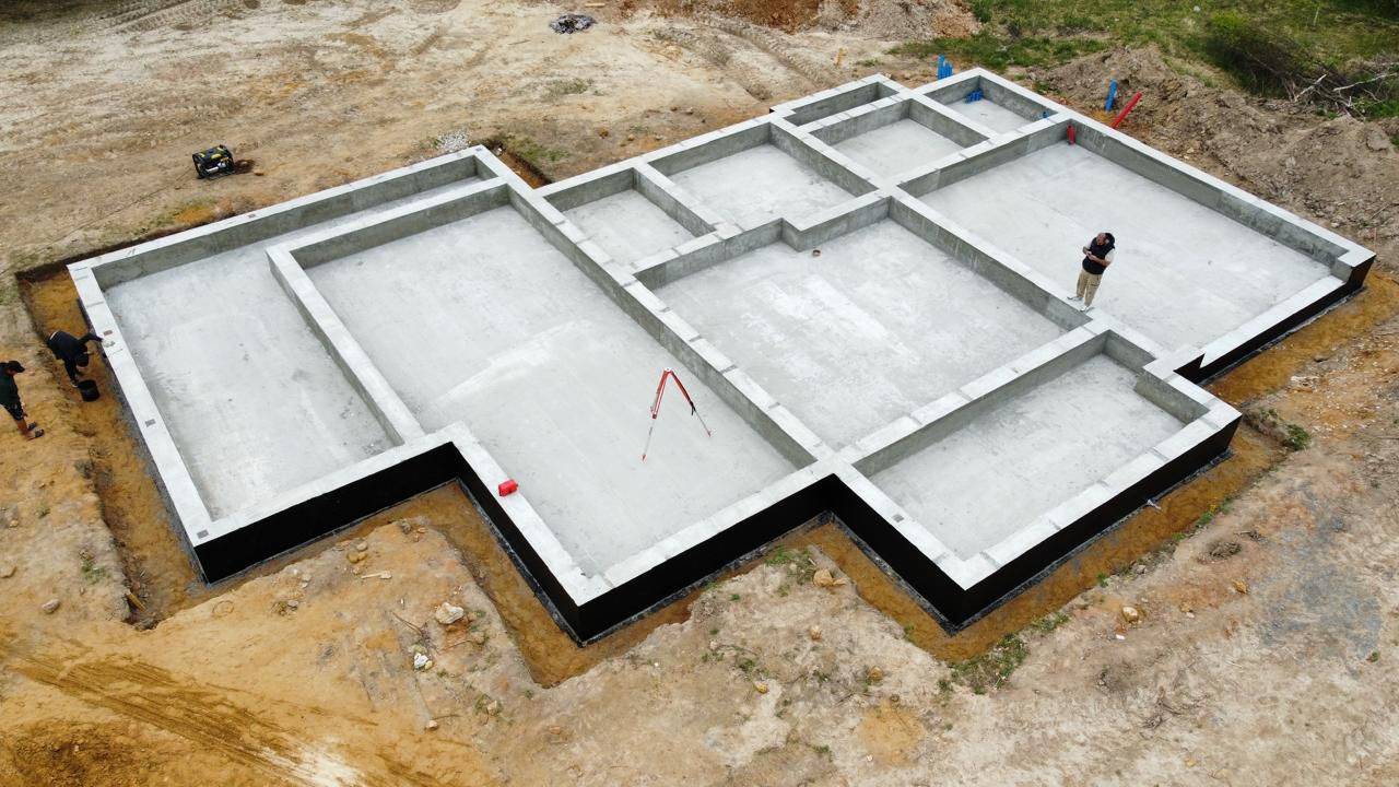 Фундамент монолитная плита с рёбрами жесткости вверх смотреть онлайн