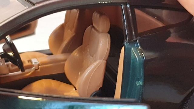 Aston Martin V12 Vanquish 1/18 Bburago смотреть онлайн