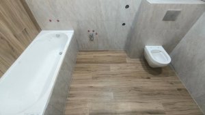 Укладка плитки в санузле.