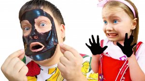 Чёрная маска на лице у Миланы и папы