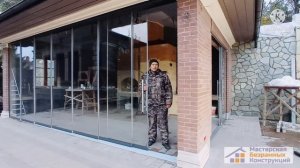 Беседка со стеклянным раздвижным фасадом, выполненном в системе СЛАЙД