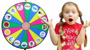 Милана и папа играют в колесо Фортуны