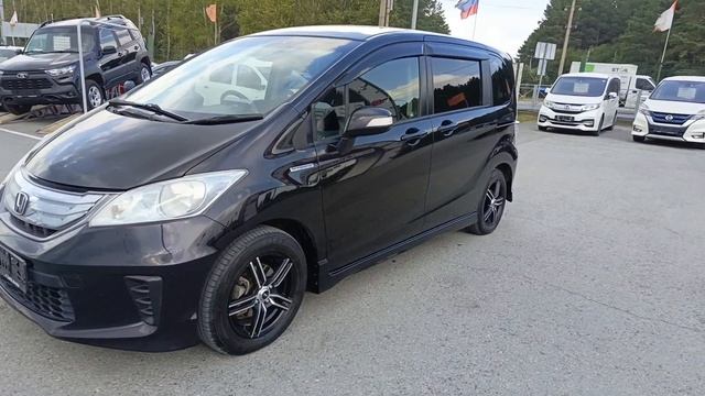 Honda Freed 1,5 л. Гибрид Вариатор (88 л.с.) 2WD 2011 смотреть онлайн