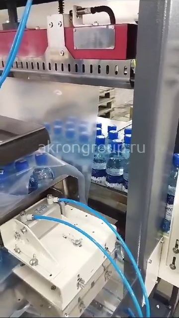 Групповая упаковка бутылок на аппарате ТМ-1А