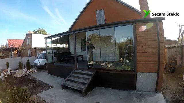 Безрамное остекление раздвижное остекление террасы в Тимашевске