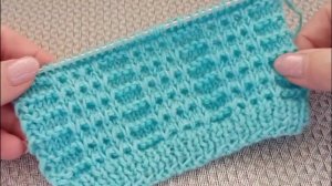 Красивый и несложный рельефный узор спицами поворотными и круговыми рядами.