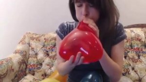 Girl blow Heart Balloon