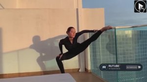 Yoga flow stretch frogs legs Stretching on rooftop