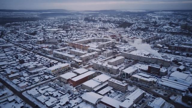 Панорамный обзор заснеженного красноуфимска.