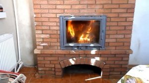 Обычная печь из кирпича  с водяным контуром для отопле