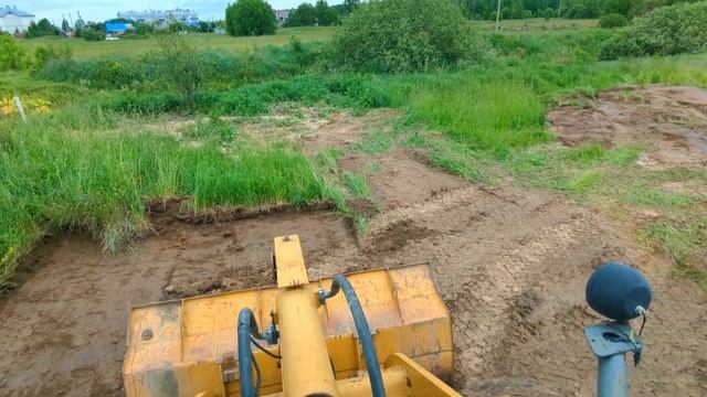 Планировка участка фронтальным погрузчиком.