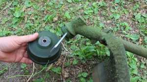 Как снять катушку( шпулю) с триммера?