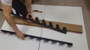 Держатель для садовых инструментов настенный.