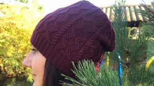 Шапка с аранами на вязальной машине