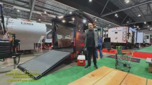 С гаражом. Внедорожный прицеп автодом Flaer Explorer. На 2 спальных места