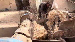 Работа камнедробилки