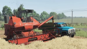 Старичок комбайн "КОЛОС" СК-6 убирает пшеницу в Журавлёво