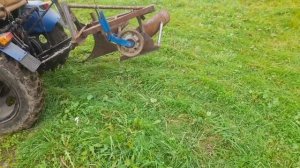 Самодельный двухкорпусный плуг из газового балона.