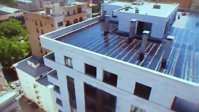 Укладка материала Эластоизол ПРЕМИУМ ЭПП (нижний слой)