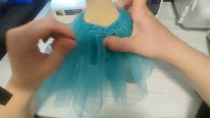 Сборка одежды и фиксация юбки-пачки.