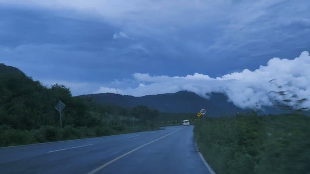 mixkit-going-down-a-curved-highway-through-a-mountain-range-41576-hd-ready смотреть онлайн