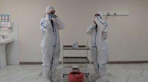 Надевание защитного костюма Каспер