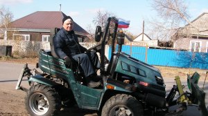 Планировка земли минитрактором.