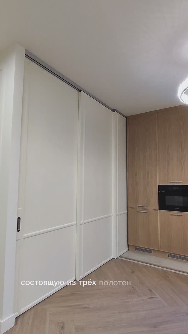 Раздвижная перегородка в эмали в реализованном проекте дизайнера Ольги Дудиной