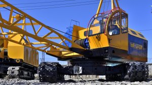 Гусеничный кран МКГ-25 серия с новой кабиной