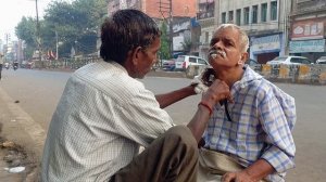 Уличный парикмахер