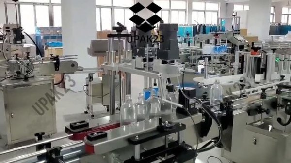 Производственная линия розлива , укупорки и этикетировки с подающим столом