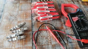 Распаковка и обзор на мультиметра и свечей зажигания.проверка на работоспособность.