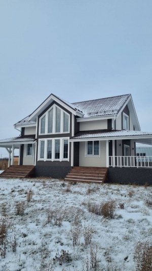 Обзор двухэтажного дома  из СИП панелей со вторым светом.