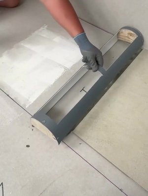 Практичное приспособление для укладки плитки