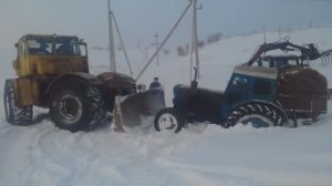 Вытаскивание Т-40 и чистка снега К-700 А