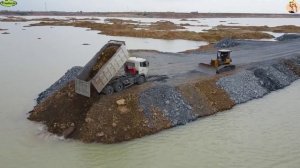 Строительство, дорога через озеро, засыпка
