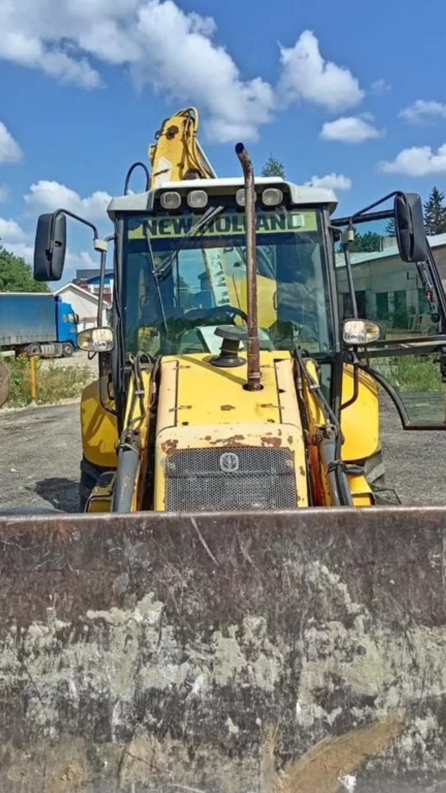 Замена гидравлического масла Экскаватор погрузчик New HOLLAND 110.🙃 смотреть онлайн