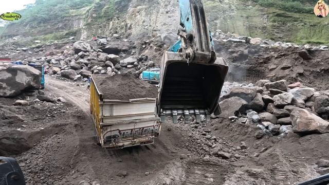 Строительство, экскаватор копает песок смотреть онлайн