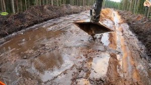 Строительство, дренажные работы в лесу, продолжение