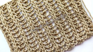 Красивый узор с выраженными вертикалями и мелким ажуром