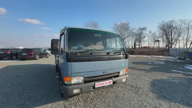 Nissan Atlas 1994 — бортовой грузовик 3.5 т, дизель 4.6 л, МКПП смотреть онлайн