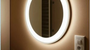 Навешиваем на стену и подключаем зеркало с подсветкой.