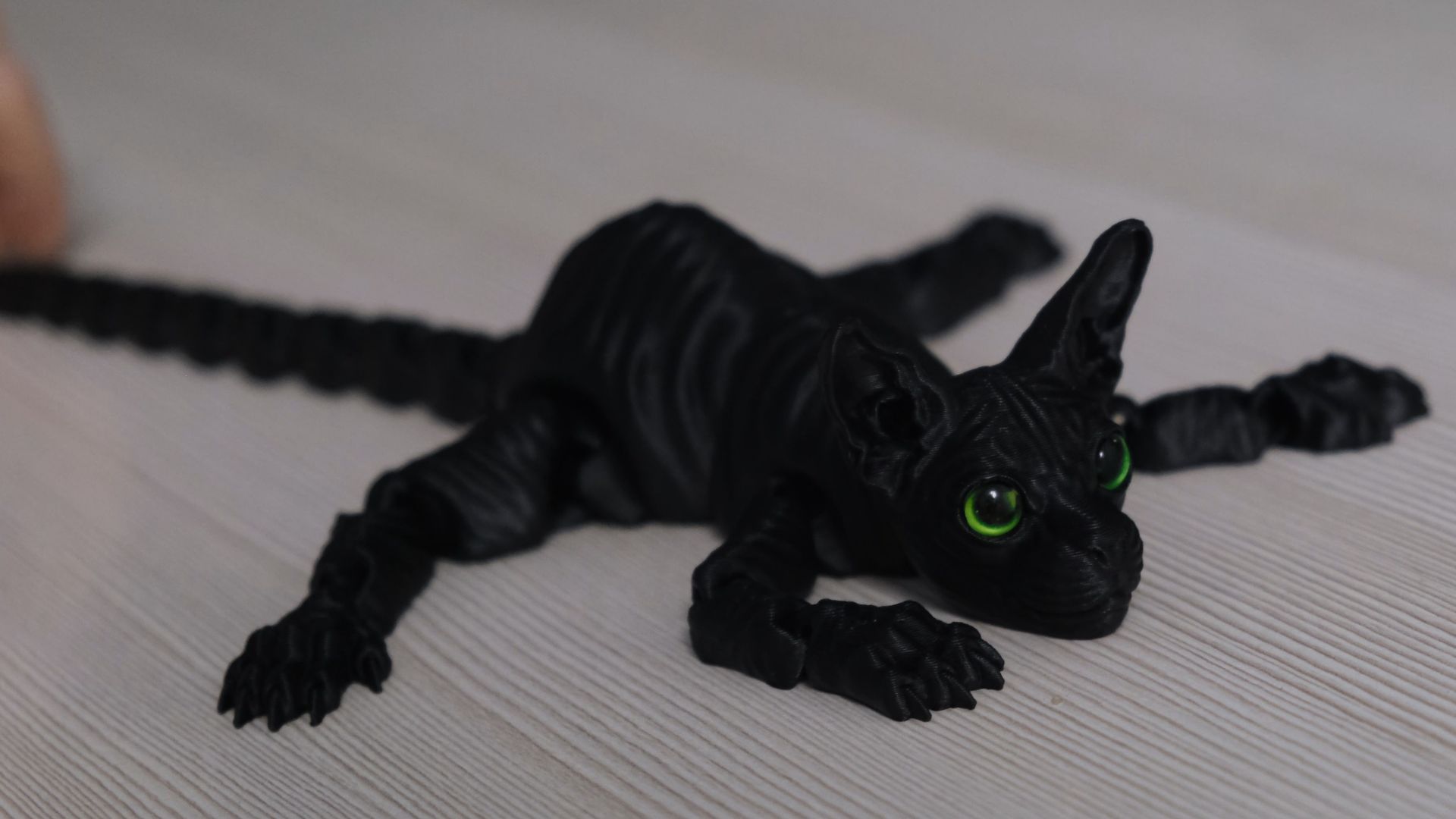 Черный 3D-кот-сфинкс — это не просто фигурка, а хранитель тайн и проводник в мир фантазий. смотреть онлайн
