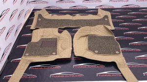 A43 | Ковры салона 3D Toyota Land Cruiser 100 / LX470 (бежевый с золотой строчкой)