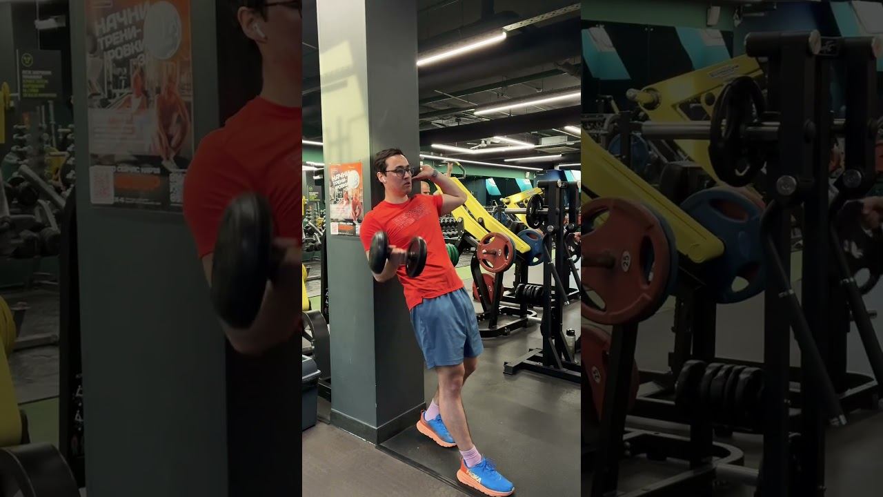 Подъем на бицепс у стены одной рукой